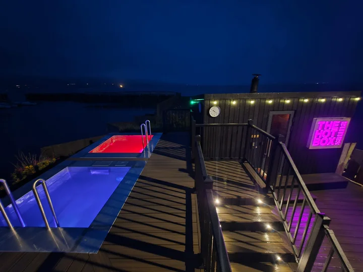 The route beside the plunge pools, with steps between deck levels.