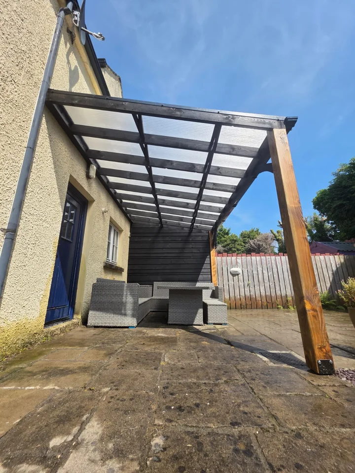 The translucent roof panels and supporting timber frame.